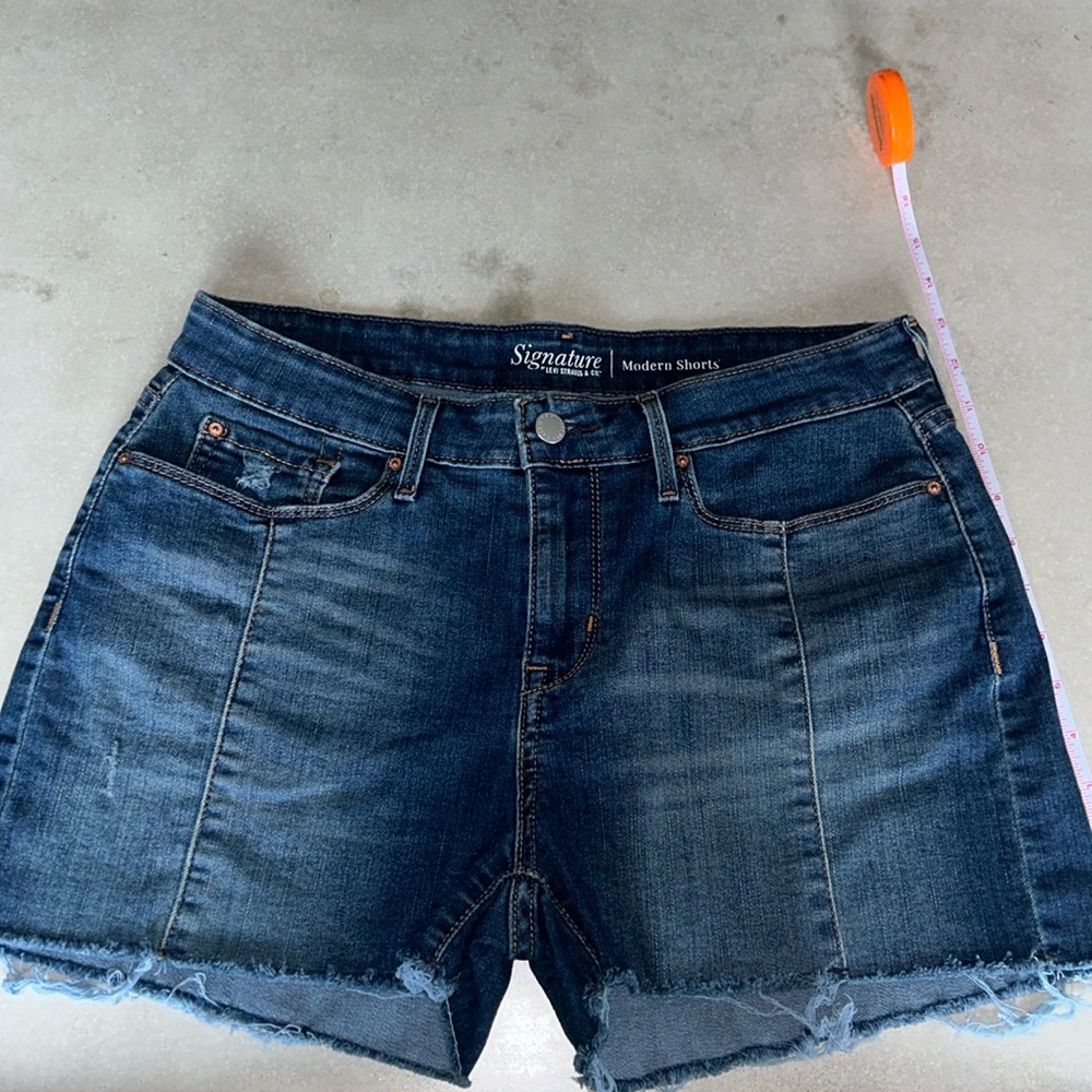 Levi’s dark wash cut off denim Shorts stretch | size 10